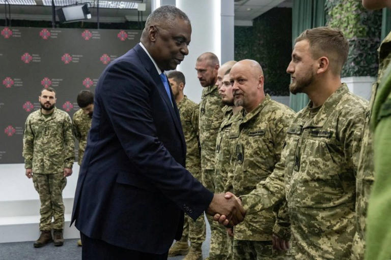 "US Defense Secretary Lloyd Austin meets with Ukrainian servicemen during a surprise visit to Kyiv, reinforcing the strong ties between the two nations