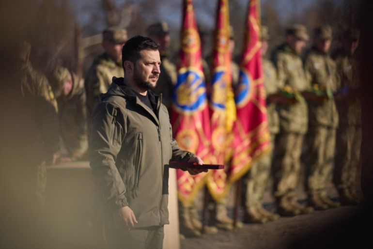 Ukrainian President Volodymyr Zelenskyy, pictured presenting military awards, is considering whether to proceed with next year’s election 