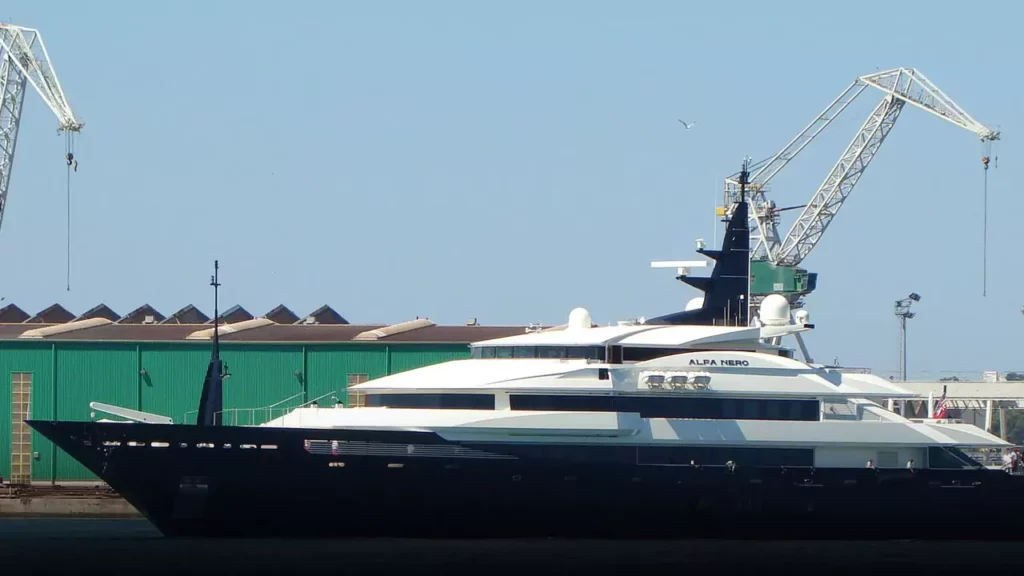 This image shows the superyacht Alfa Nero docked in Falmouth Harbour, Antigua.